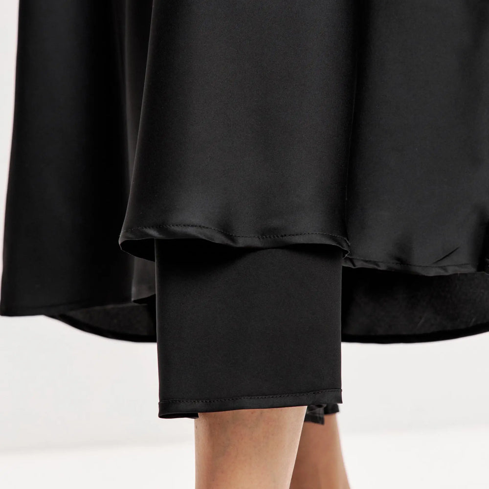 
                  
                    Black maxi double-layered satin slip dress with V-neck ’Marigold’
                  
                
