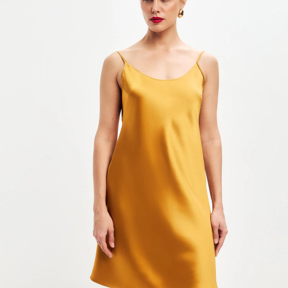 
                  
                    Dark gold mini satin slip dress ’Pure’
                  
                